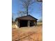 Spacious two-car garage featuring an unfinished interior, neutral siding, and plenty of potential for storage and projects at 6110 Harvest Way, Cumming, GA 30028