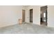 Unfinished room with two doorways and a closet visible at 6110 Harvest Way, Cumming, GA 30028