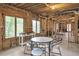 Spacious basement with exposed framework, several windows with views, and flexible space for entertainment at 2885 Coles Way, Atlanta, GA 30350