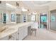 Large bathroom with a garden tub, a walk-in shower, and a long vanity with great lighting at 2885 Coles Way, Atlanta, GA 30350
