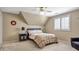 Cozy bedroom featuring a ceiling fan, neutral walls, and a comfortable-looking bed with a patterned quilt at 2885 Coles Way, Atlanta, GA 30350