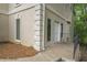 Exterior view of the home featuring stucco and concrete walls, and a gated balcony at 2885 Coles Way, Atlanta, GA 30350