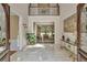 Grand foyer with soaring ceilings, a chandelier, marble floors, and a balcony overlook at 2885 Coles Way, Atlanta, GA 30350