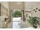 Expansive foyer featuring marble floors, chandelier, and an open view of the front yard at 2885 Coles Way, Atlanta, GA 30350