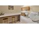 Laundry room with utility sink, appliances, white countertops, and extra cabinet space at 2885 Coles Way, Atlanta, GA 30350