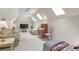 Bright living room with skylights, plush seating, and a television for entertainment at 2885 Coles Way, Atlanta, GA 30350