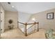 Carpeted staircase with white railing leading to the upper level of the home at 2885 Coles Way, Atlanta, GA 30350
