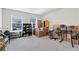 Large bonus room filled with boxes, clothing rack, and drum set; excellent space for storage at 311 Ivy Chase Loop, Dallas, GA 30157