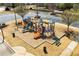 Aerial view of a colorful community playground, providing a safe and fun space for children to play at 311 Ivy Chase Loop, Dallas, GA 30157