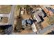 Aerial view of a home with a basketball court, spacious backyard, and a tree lined street at 5289 Browning Sw Way, Lilburn, GA 30047
