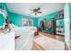 Bedroom with teal walls and a white vanity at 5289 Browning Sw Way, Lilburn, GA 30047