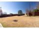 Spacious yard shot featuring cement pad, shed and fencing at 5289 Browning Sw Way, Lilburn, GA 30047