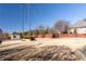 Full shot of large backyard with cement pad, shed and fencing at 5289 Browning Sw Way, Lilburn, GA 30047