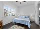 Bedroom with a large window and light blue furnishings at 5930 Brundage Ln, Norcross, GA 30071