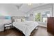 Bedroom featuring hardwood floors, large window, vaulted ceiling and neutral colors at 5930 Brundage Ln, Norcross, GA 30071