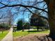 Beautiful community park with mature trees, walking paths and an outdoor stage at 5930 Brundage Ln, Norcross, GA 30071