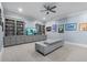 Living room with grey built-ins and a modern grey couch at 5930 Brundage Ln, Norcross, GA 30071
