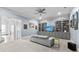 Living room featuring built-in shelving and a comfortable gray sofa at 5930 Brundage Ln, Norcross, GA 30071