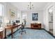 Bright office with hardwood floors, a large desk, and two windows offering lots of natural light at 5930 Brundage Ln, Norcross, GA 30071