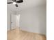 Bright, minimalist bedroom featuring hardwood floors and a doorway at 6405 Cherry Tree Ln, Atlanta, GA 30328