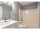 Bright bathroom featuring a tub/shower combo and a modern vanity at 1321 Stoneleigh Dr, Conyers, GA 30094