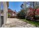 A look at the home's well landscaped backyard featuring mature trees and healthy lawn at 2848 Stockbridge Way, Dacula, GA 30019