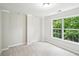 Bright and airy bedroom with large windows providing ample natural light at 2848 Stockbridge Way, Dacula, GA 30019