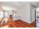 Inviting living room featuring a fireplace, ample natural light, and hardwood floors at 2848 Stockbridge Way, Dacula, GA 30019