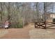 Wooded trail entrance with split rail fence and community signage, offering natural surroundings and community pathways at 2848 Stockbridge Way, Dacula, GA 30019