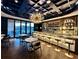 Upscale bar features a modern chandelier, fully stocked shelves, and comfortable seating at 370 2Nd St, Fayetteville, GA 30214