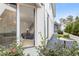 Inviting entryway with open door view of living area, staircase, and backyard landscape at 370 2Nd St, Fayetteville, GA 30214