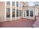 Large back deck offers outdoor living and dining with a view of the backyard and trees at 5114 Parkwood Oaks Ln, Mableton, GA 30126
