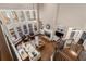 Bright living room with fireplace, hardwood floors, and large windows leading to the deck at 5114 Parkwood Oaks Ln, Mableton, GA 30126