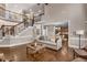 Spacious living room with a staircase, neutral colors, and hardwood floors at 5114 Parkwood Oaks Ln, Mableton, GA 30126