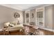 Cozy sitting room with hardwood floors, two large windows, and elegant furnishings at 5114 Parkwood Oaks Ln, Mableton, GA 30126