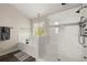 Luxurious bathroom with separate shower and tub, modern fixtures, and natural light at 1830 Marietta Nw Rd, Atlanta, GA 30318
