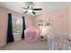 Bright Bedroom features a play tent, plush carpeting, and a large window with curtains at 1830 Marietta Nw Rd, Atlanta, GA 30318