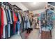 Walk-in closet with hanging racks and shelves offering plenty of storage space at 1830 Marietta Nw Rd, Atlanta, GA 30318