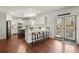 Spacious kitchen features a breakfast bar, stainless steel appliances, and access to outdoor patio at 1830 Marietta Nw Rd, Atlanta, GA 30318