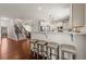Open concept kitchen features a breakfast bar with seating and stainless steel appliances at 1830 Marietta Nw Rd, Atlanta, GA 30318