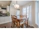 Breakfast nook with wood floors, large windows and lots of natural light at 210 Little River Farms Trl, Canton, GA 30115