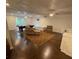 Basement featuring hardwood floors, a billiard table and furniture at 2702 Long Lake Ne Ter, Roswell, GA 30075