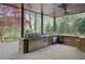 Spacious outdoor kitchen with a built-in grill, sink, and countertop space, perfect for entertaining at 2702 Long Lake Ne Ter, Roswell, GA 30075