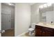 Bathroom with a vanity, tile floor, and door at 5040 Mundy Ct, Cumming, GA 30028