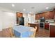 Spacious kitchen equipped with an island, stainless appliances and eat in dining at 5040 Mundy Ct, Cumming, GA 30028