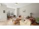 Comfortable living room features neutral decor, large windows, and plenty of space for seating at 5040 Mundy Ct, Cumming, GA 30028