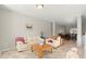 Inviting living room boasts neutral tones and comfortable seating, creating a relaxing atmosphere at 5040 Mundy Ct, Cumming, GA 30028