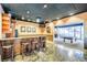 The recreational room features a bar area and an open space with a pool table, perfect for entertaining at 1280 W Peachtree Nw St # 2601, Atlanta, GA 30309