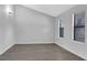 Airy bedroom with modern flooring and large windows at 3954 Springleaf Pt, Stone Mountain, GA 30083