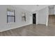 Inviting living room with wood-look flooring and abundant natural light at 3954 Springleaf Pt, Stone Mountain, GA 30083
